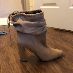 Tan suede booties with gold lined wedges